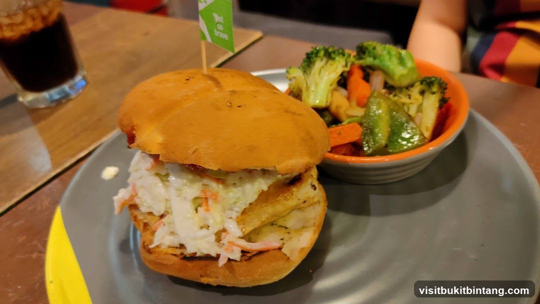 Burger with Coleslaw and Side of Vegetables