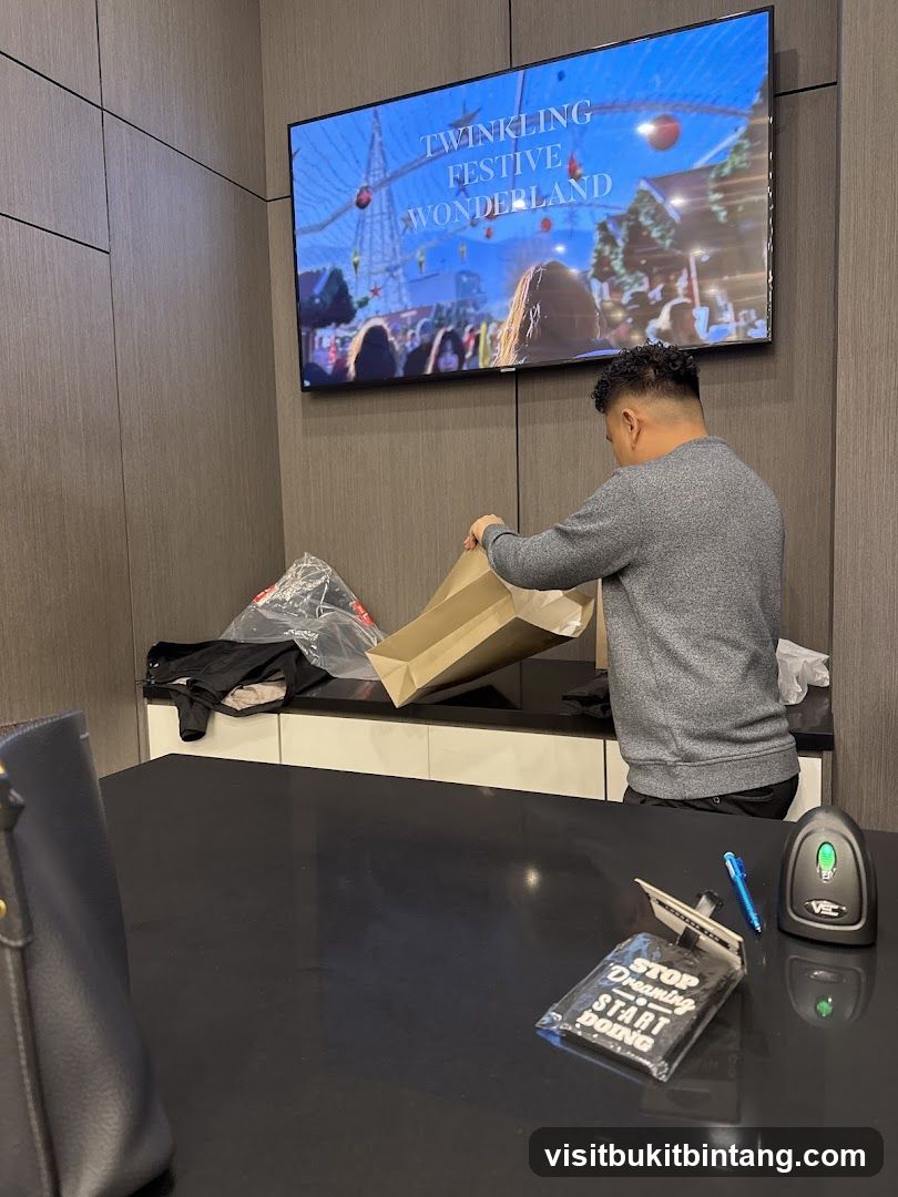 Man unpacking shopping bags