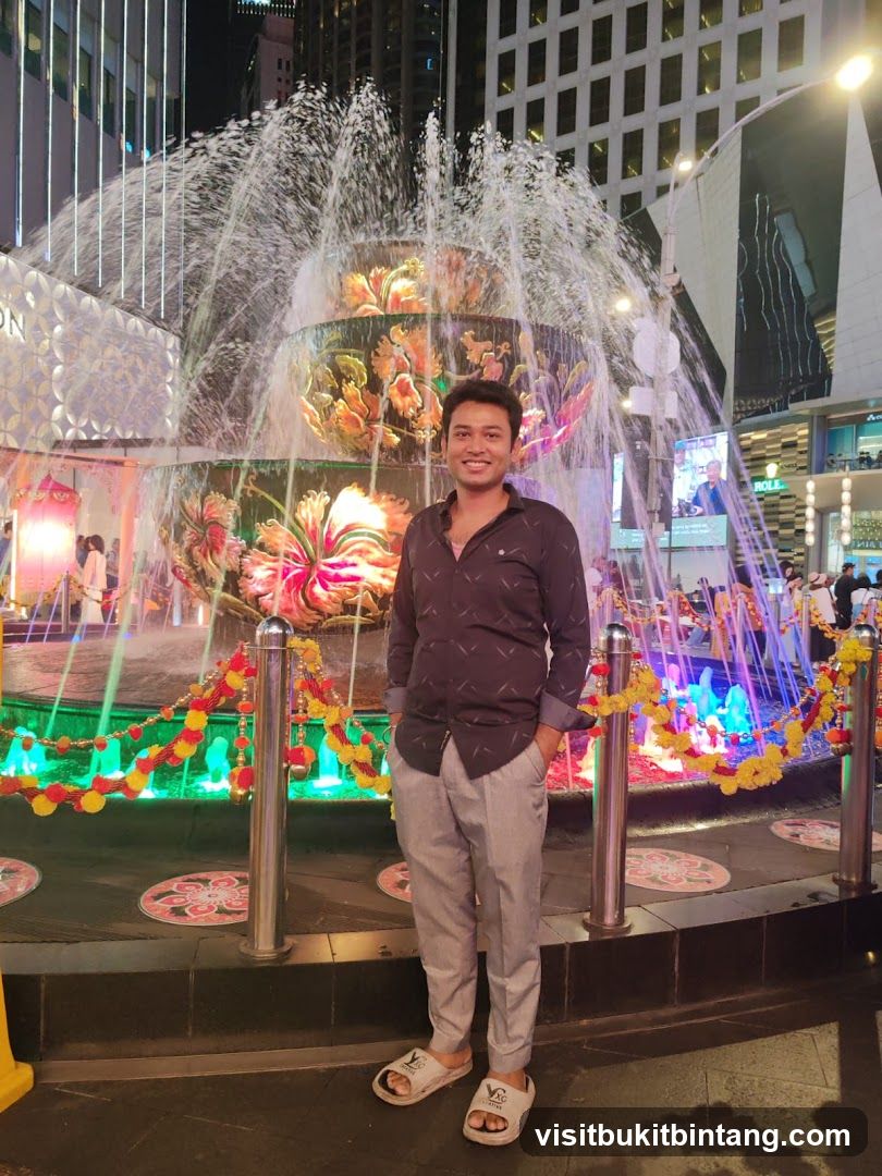 Man Posing in Front of a Fountain