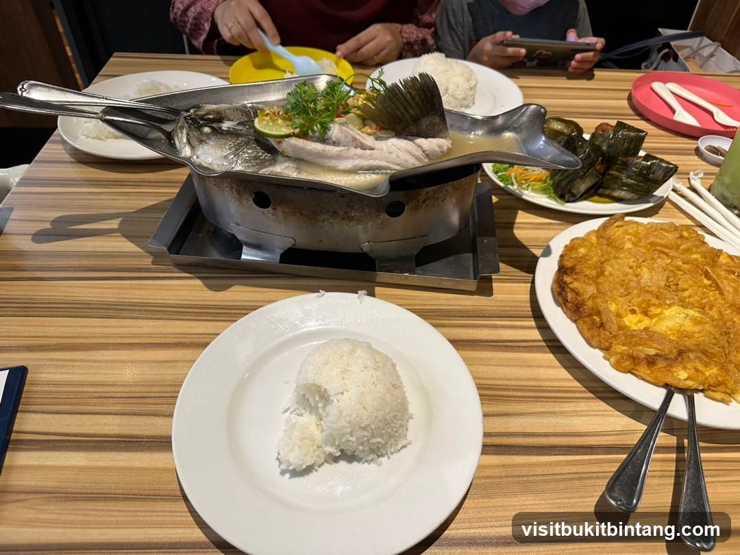 Steamed Fish with Rice and Omelette