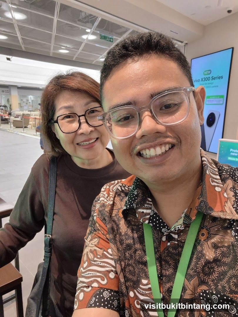 Two people smiling for a selfie