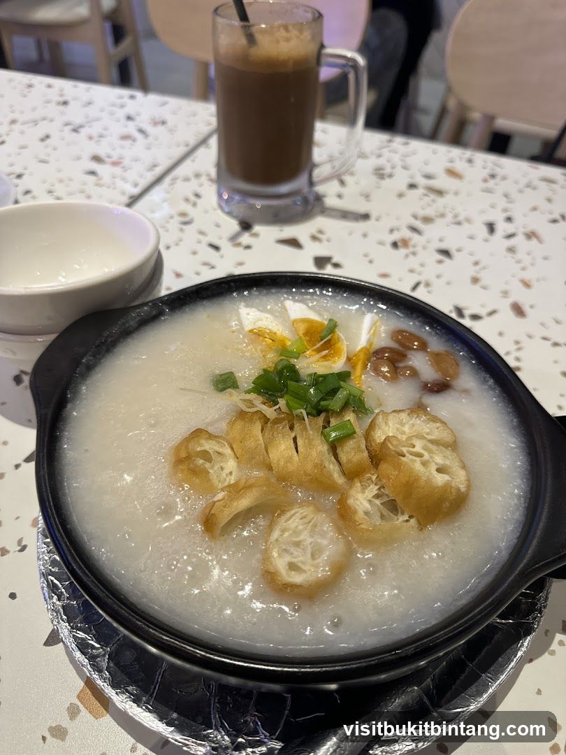 Congee with toppings and a drink