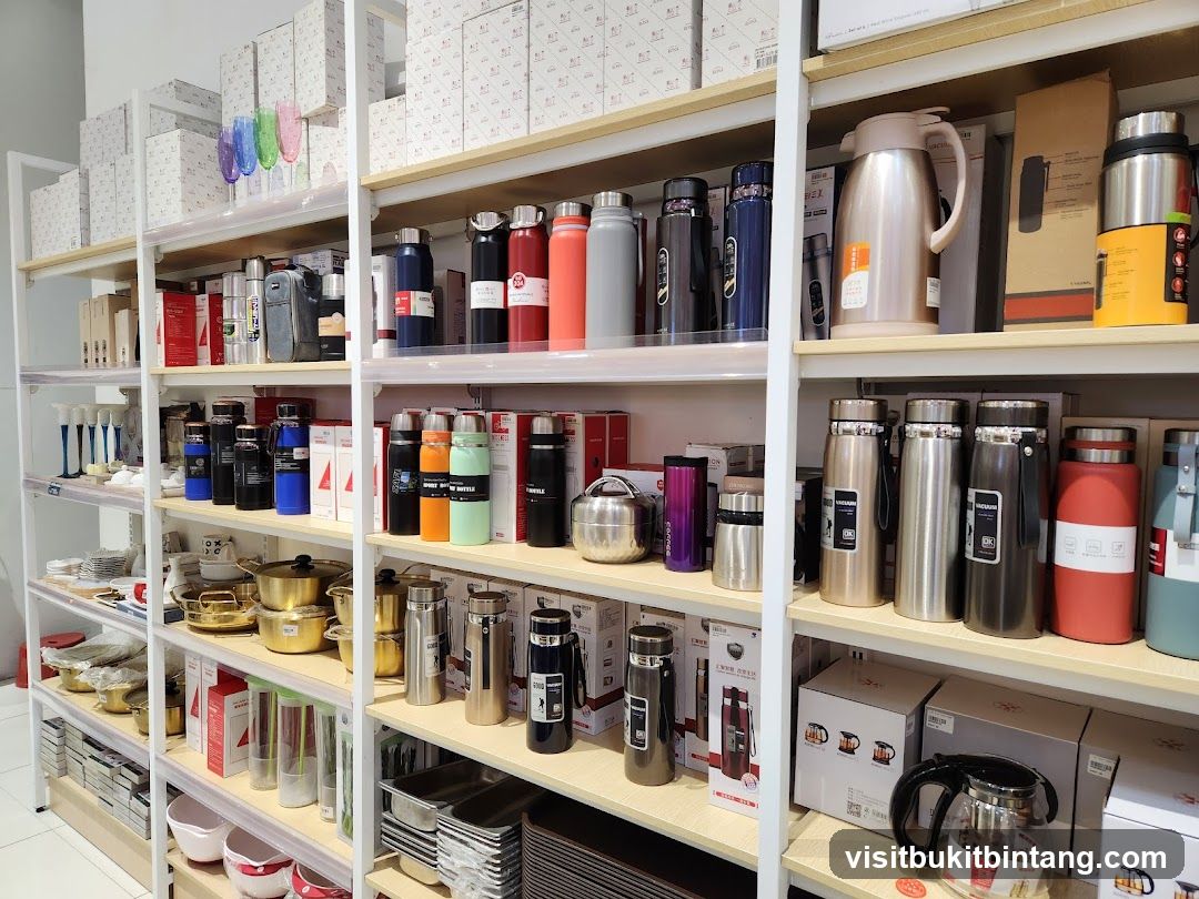Shelves stocked with various kitchenware and drinkware