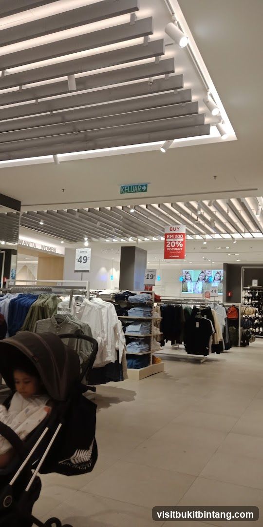 Clothing store interior with sale signs