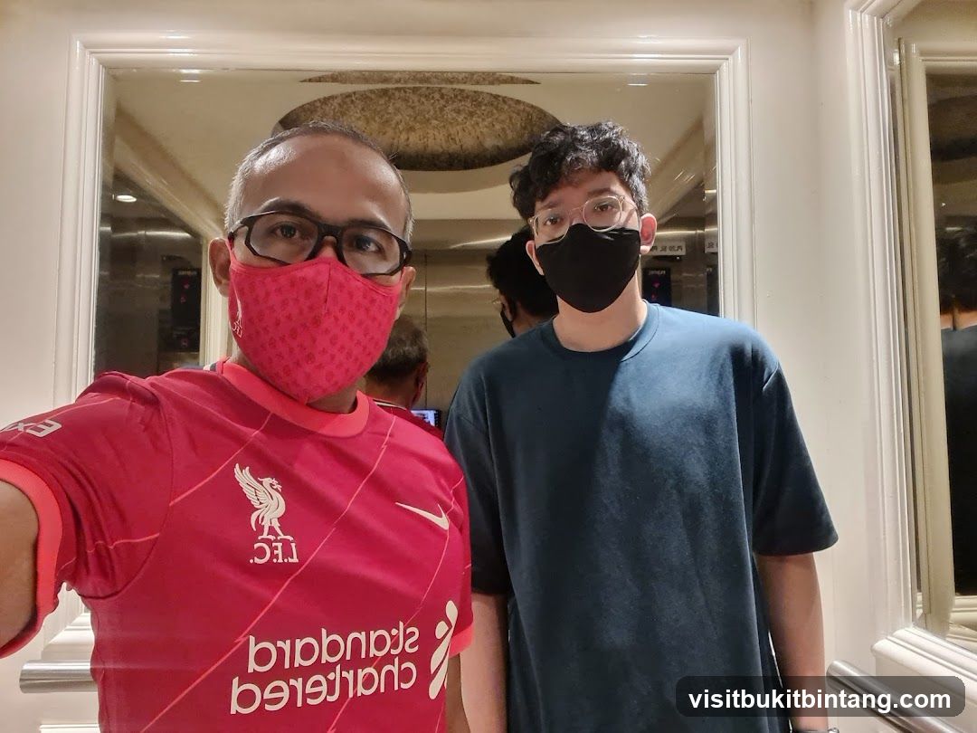 Two people wearing masks