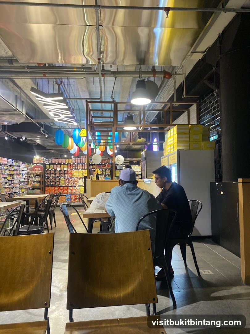 Diners at a table in a supermarket cafe