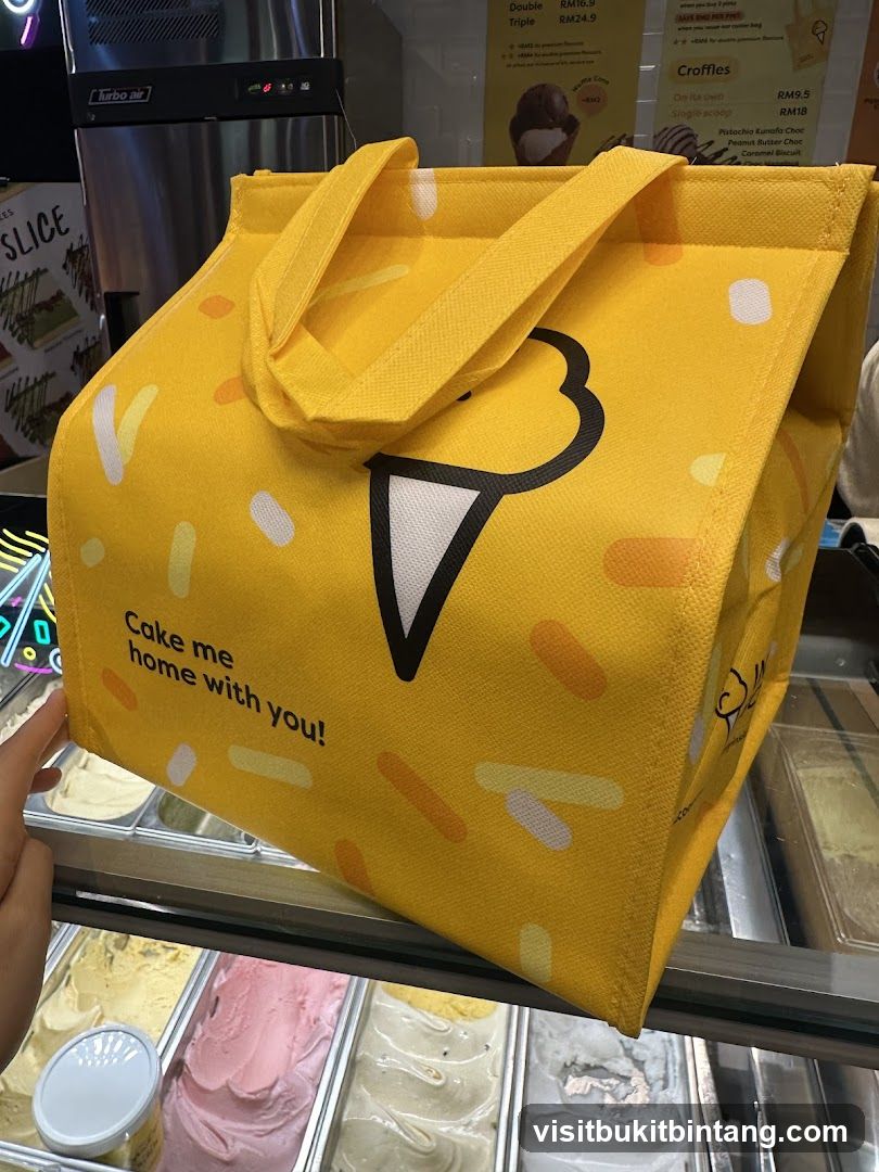 Yellow tote bag with ice cream cone graphic