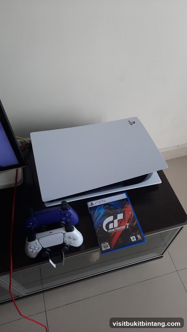 PlayStation 5 Console with Controllers and Game