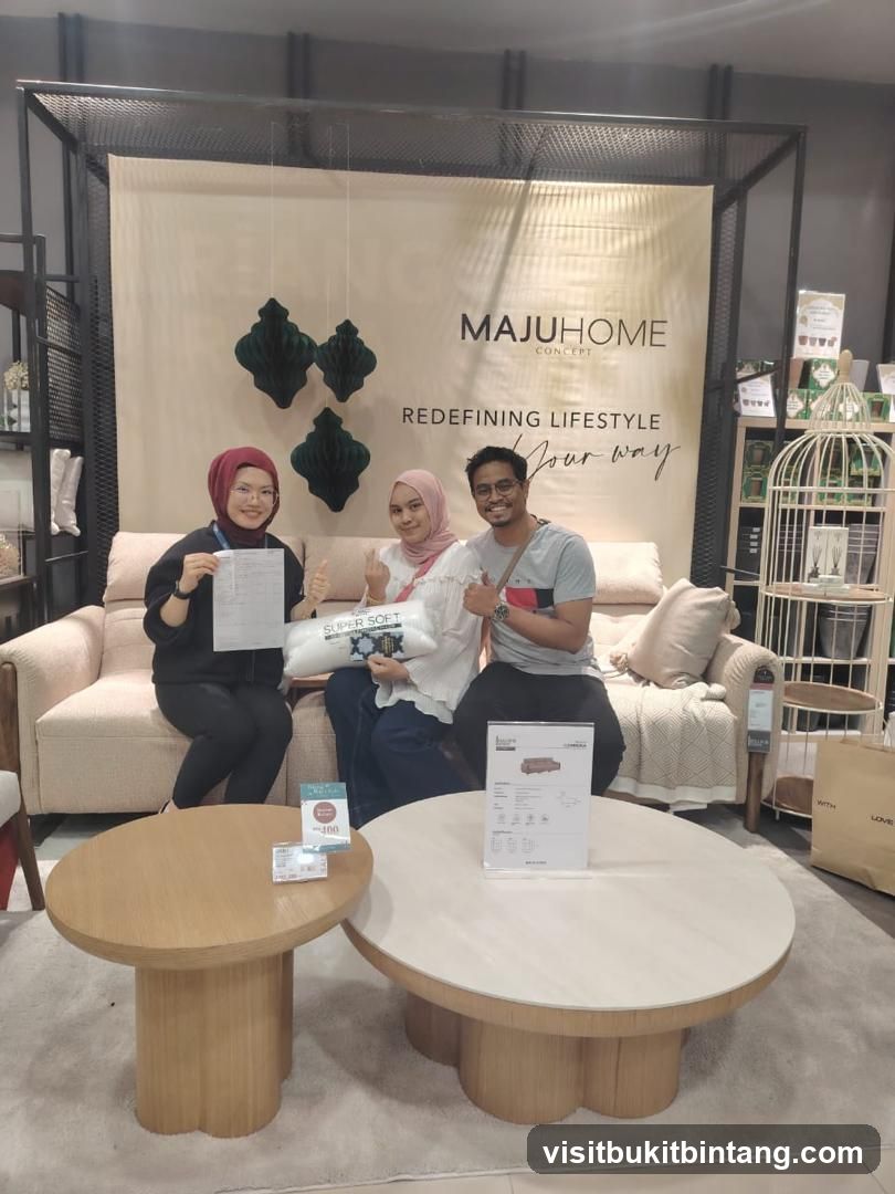 People posing in a furniture store