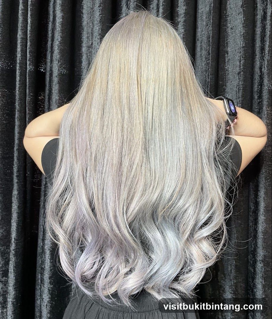Woman with long, wavy, ash-blonde hair