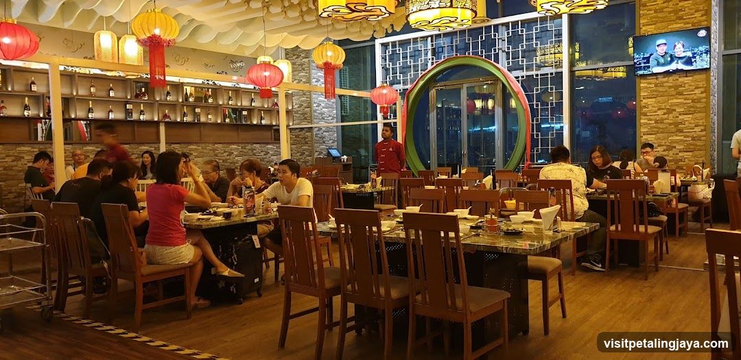 Restaurant Interior with Diners and Decorative Lighting