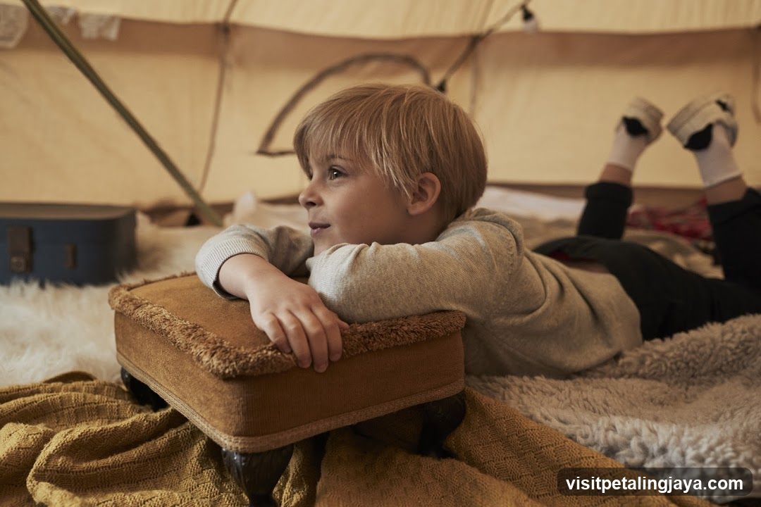 Child in Tent Interior