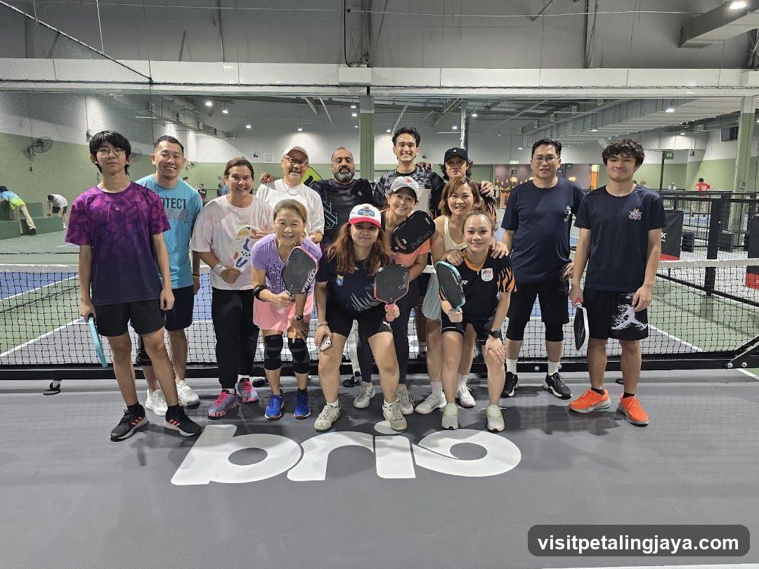Group photo at indoor pickleball court