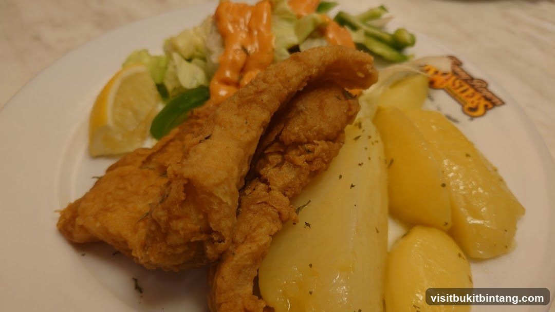 Fried Fish with Potatoes and Salad