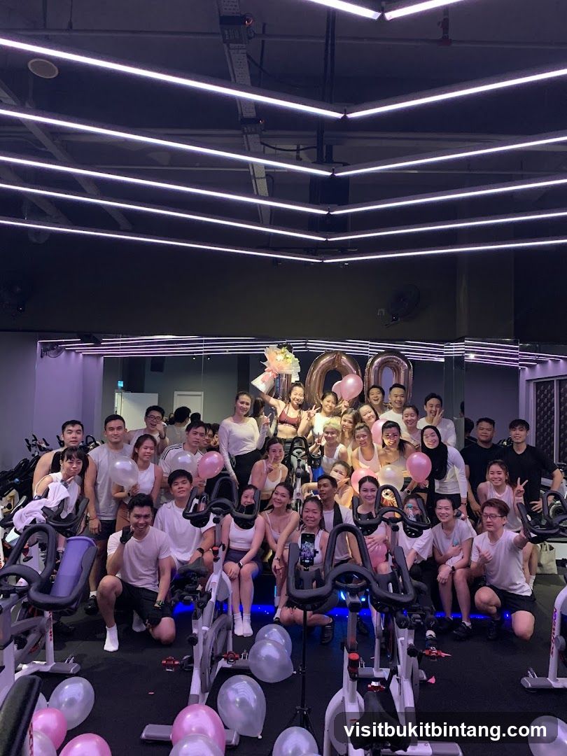 Group celebrating in a spin class