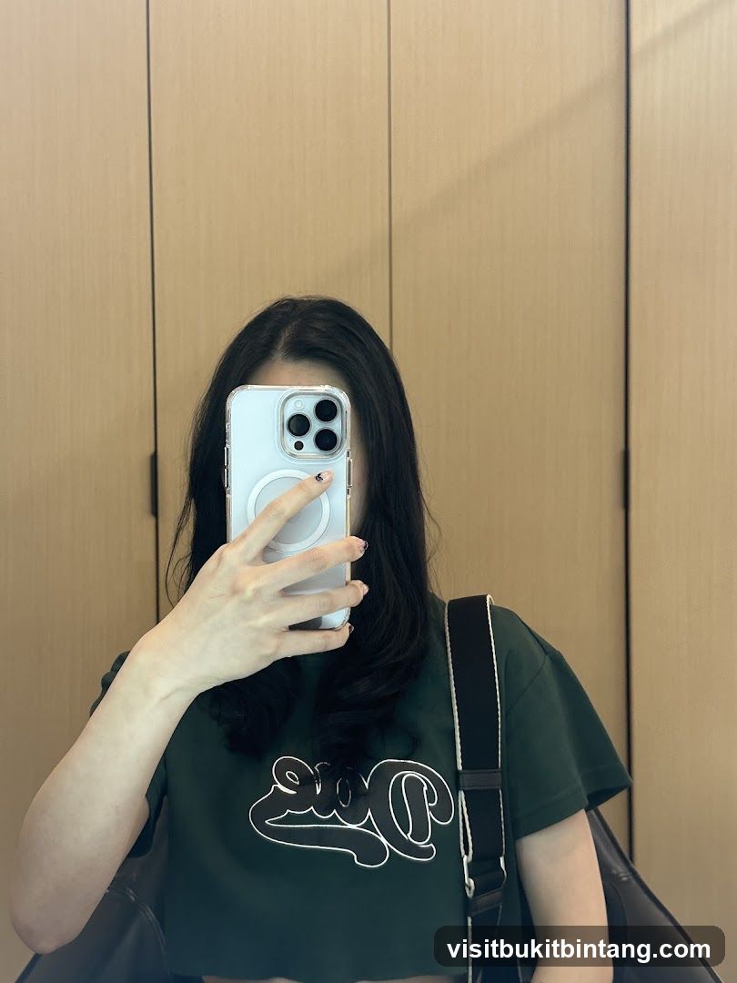 Woman taking a mirror selfie