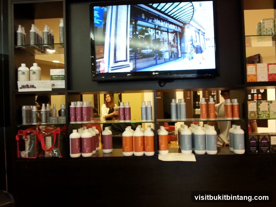 Salon Interior with Products and Display Screen