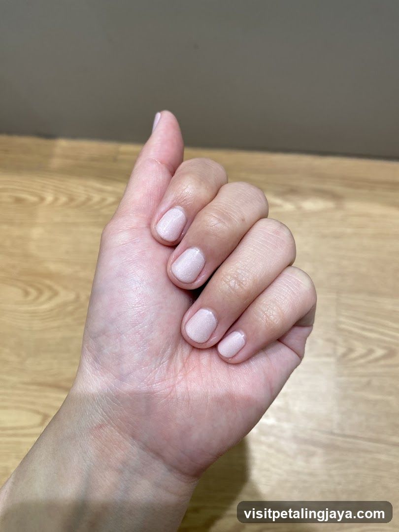 Hand with manicured nails