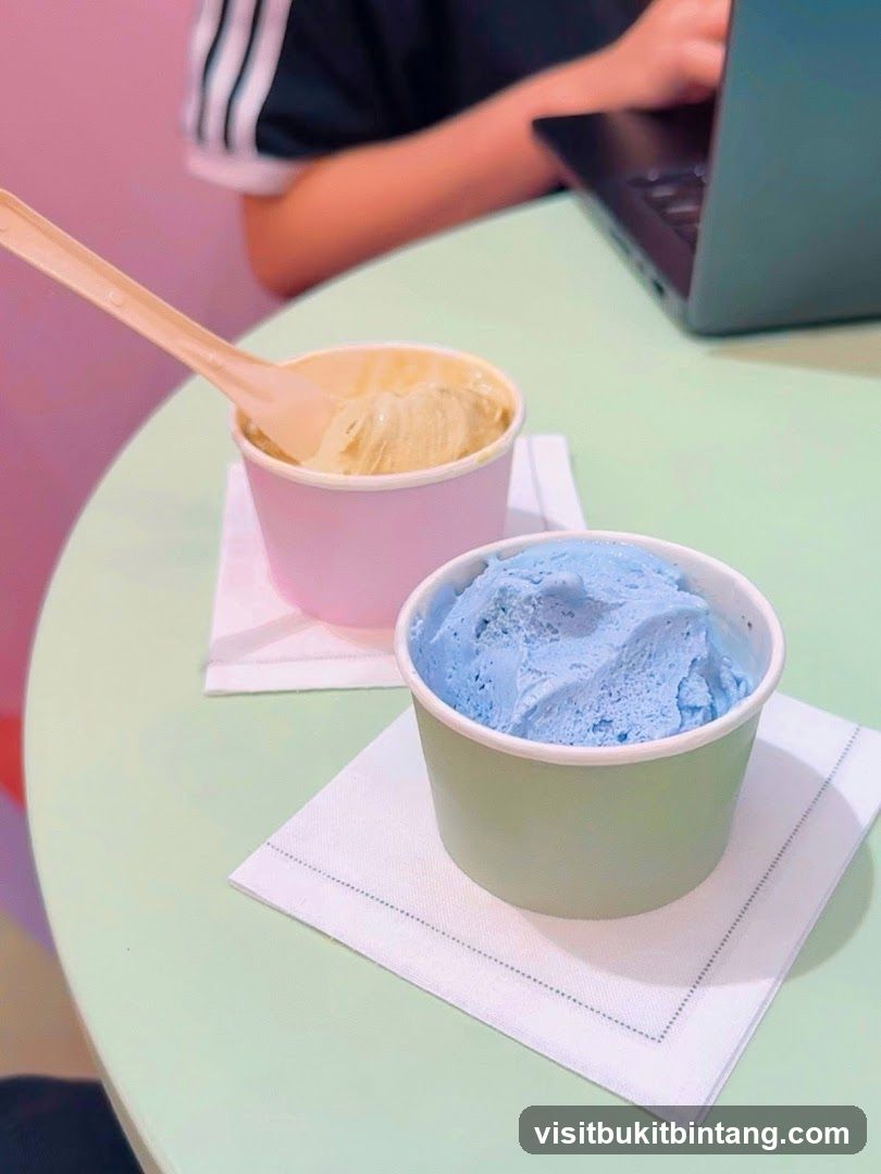Two cups of ice cream on a table