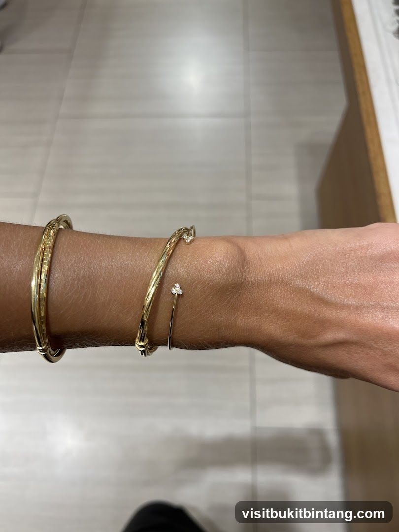 Gold Bracelets on Wrist