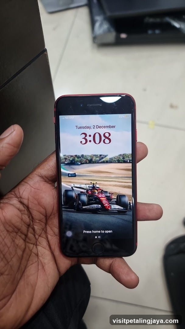 Smartphone Displaying F1 Wallpaper