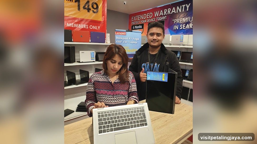 Laptop Store Interior with Staff and Products