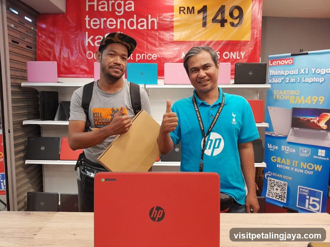 Laptop Store Interior with Staff and Products