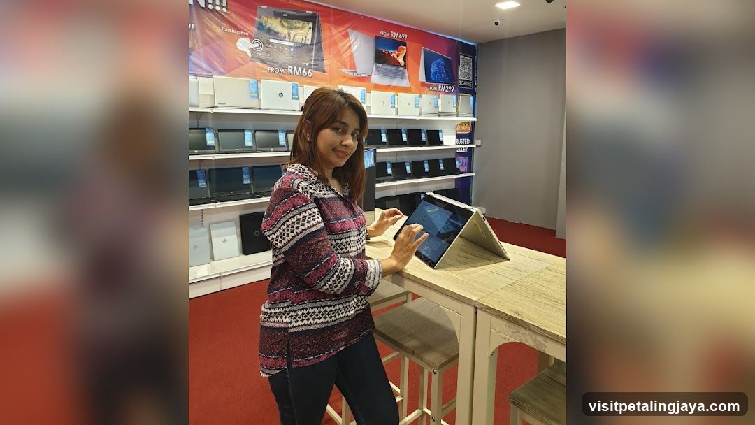 Woman in Electronics Store