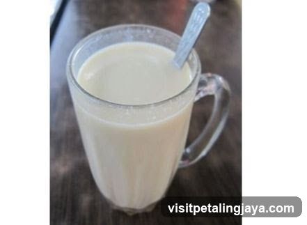 Glass of Milk with Spoon