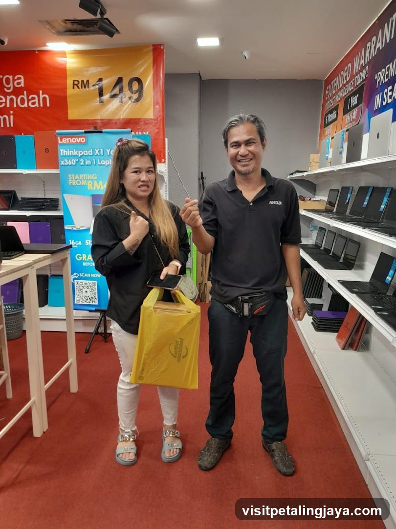 Electronics Store Interior with Staff and Customer