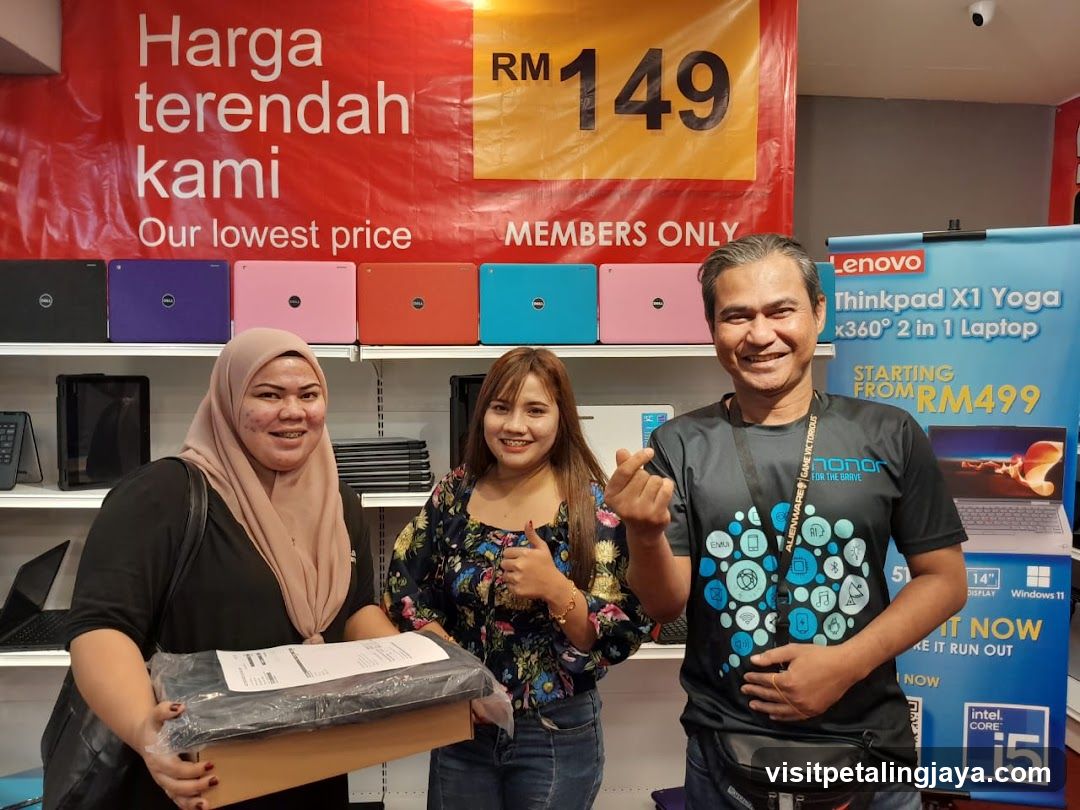 Laptop Store Interior with Staff and Products