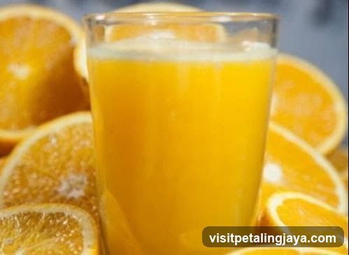 Glass of Orange Juice with Slices