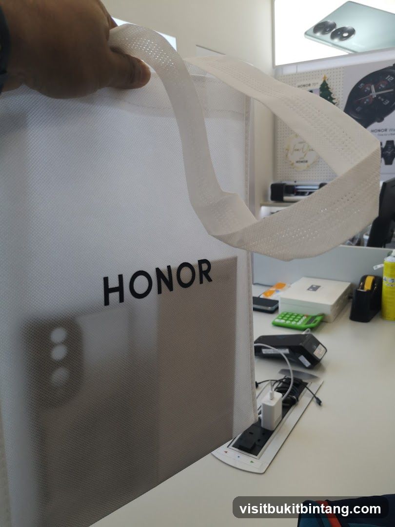 Honor branded bag with phone