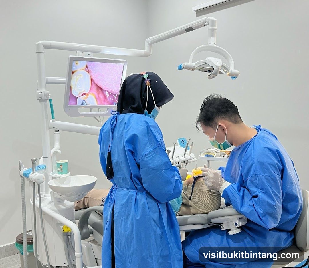 Dentist and assistant performing a dental procedure