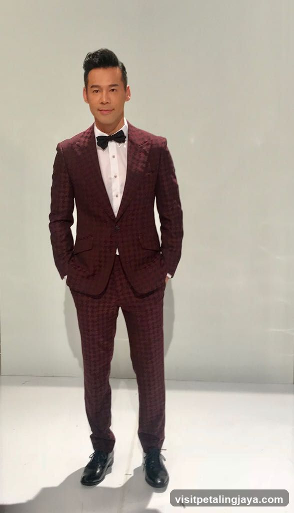 Man in Maroon Suit
