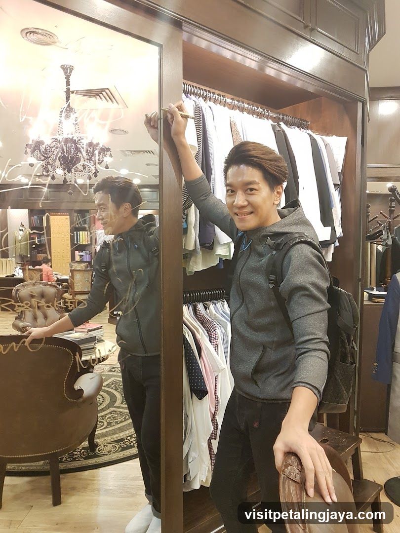 Man in Clothing Store Interior