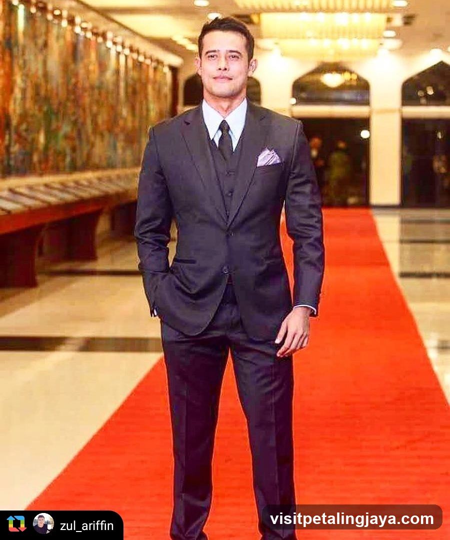 Man in Suit on Red Carpet