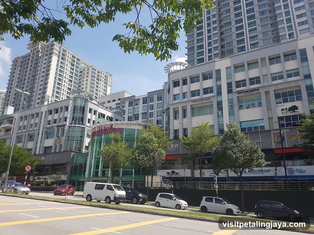 Urban Street Scene with High-Rise Buildings and Shops