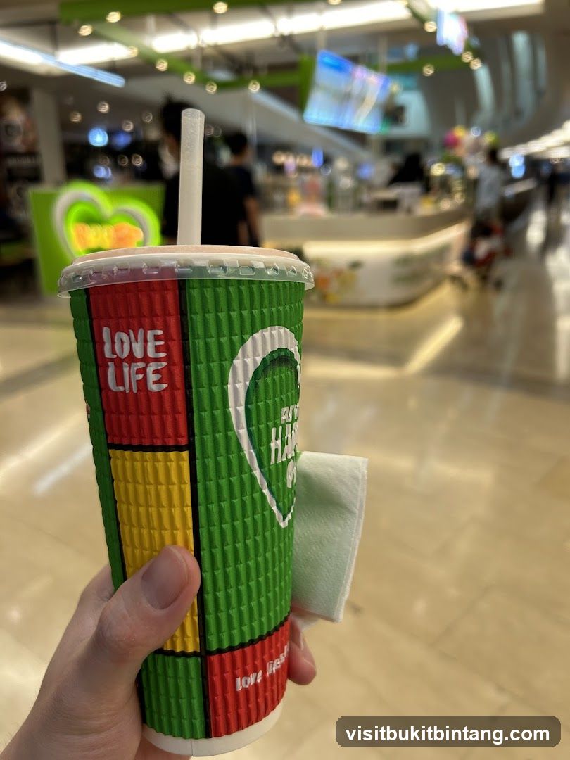 Cup with straw and napkin