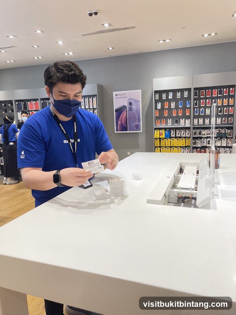 Store employee with merchandise
