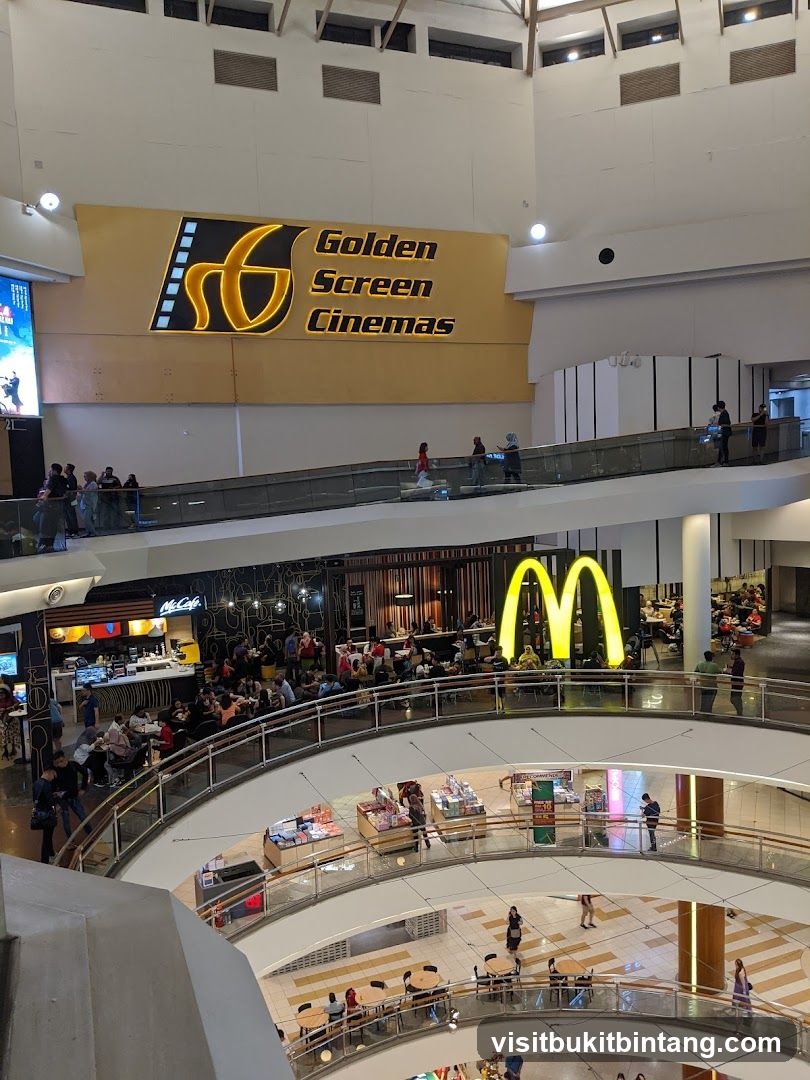 Interior of a shopping mall with a cinema and fast food outlets