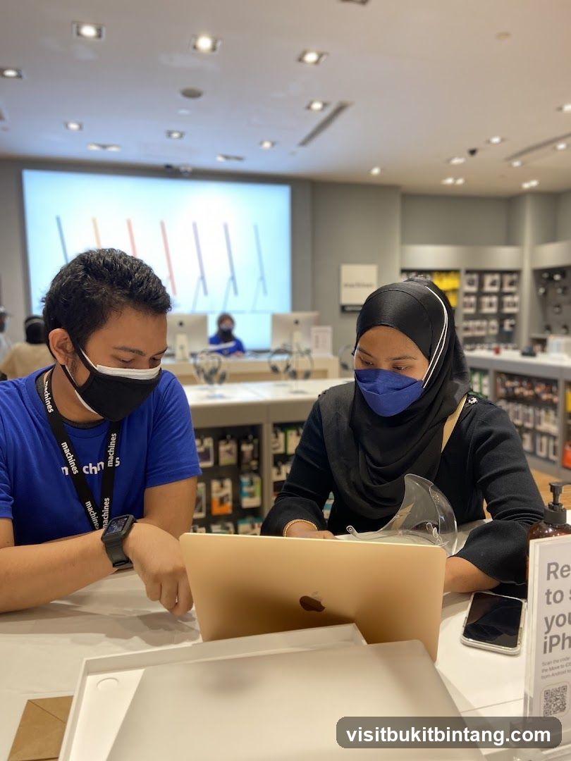 Store employees assisting a customer