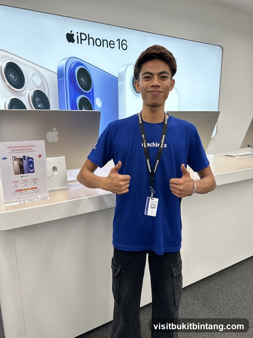 Employee giving thumbs up in Apple store