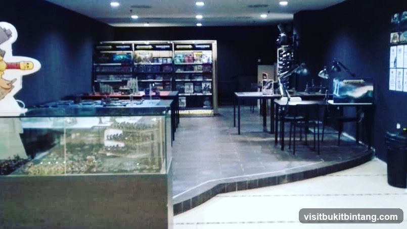 Hobby store interior with display cases and tables