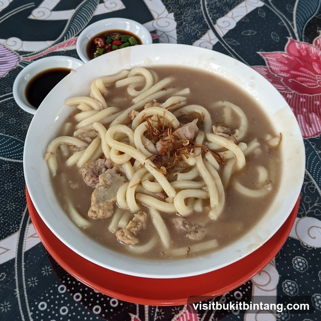 Noodle Soup with Meat and Condiments