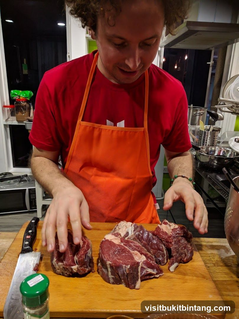 Man preparing raw meat