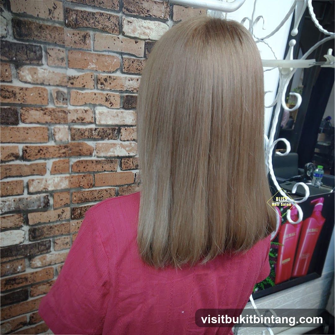Woman with Blonde Hair in Salon