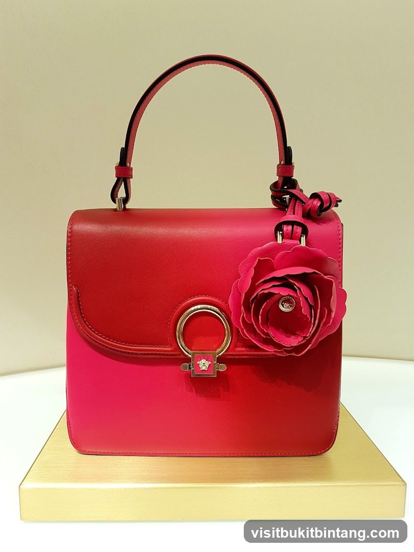 Red Handbag with Flower Accent