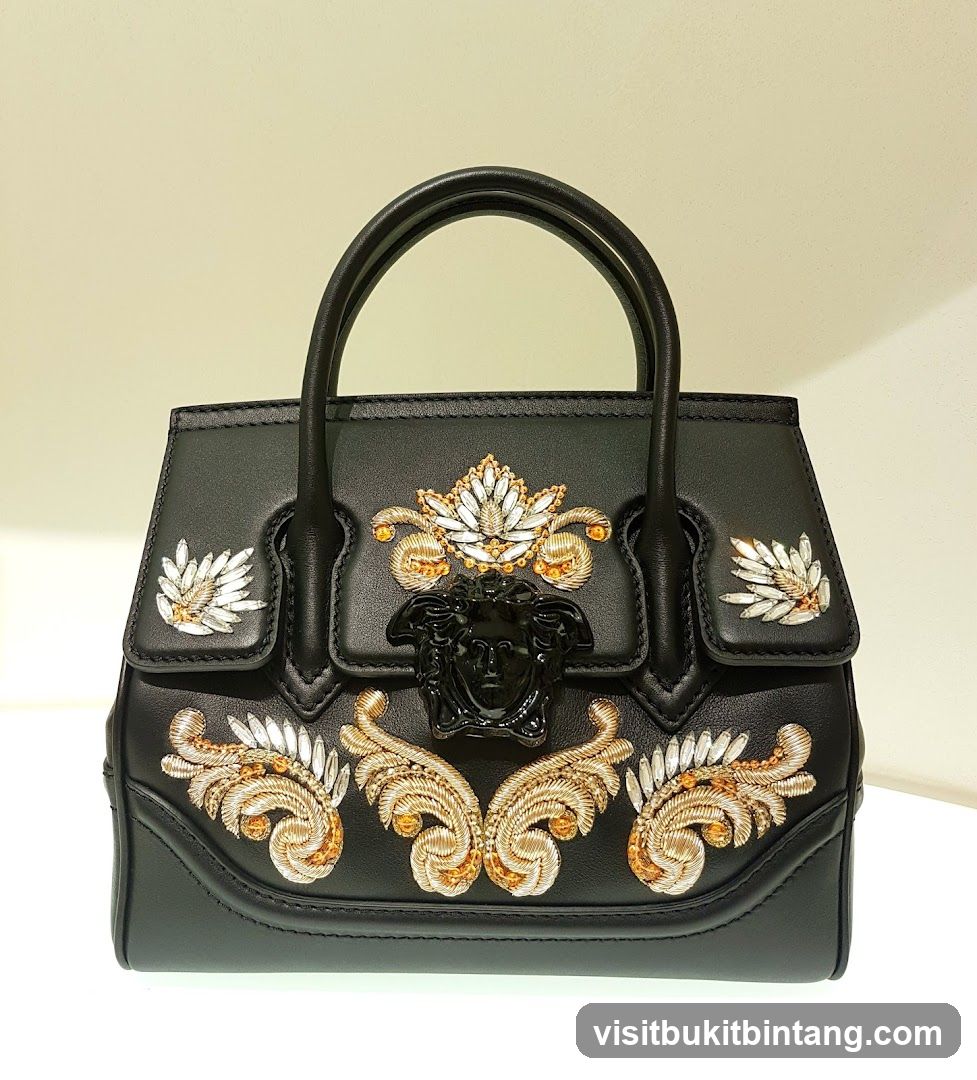 Black Leather Handbag with Embellishments