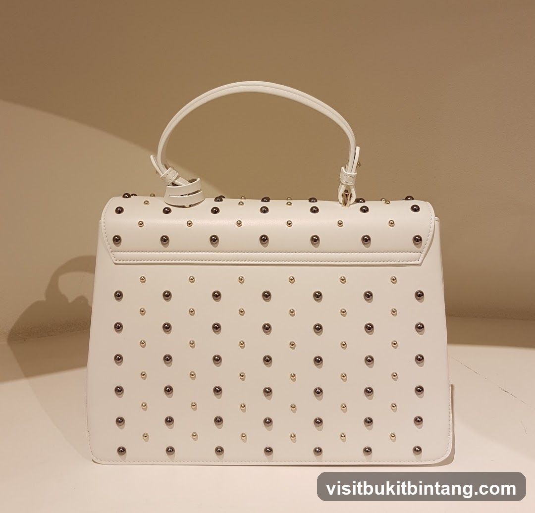 White studded handbag